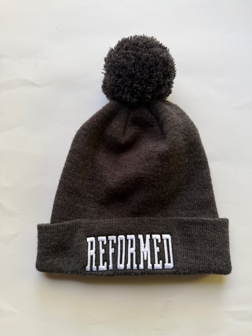Reformed Pom Pom Beanie - Black with White Embroidery